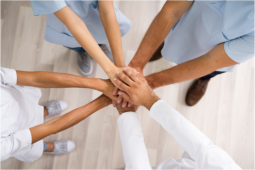 dental team in huddle 